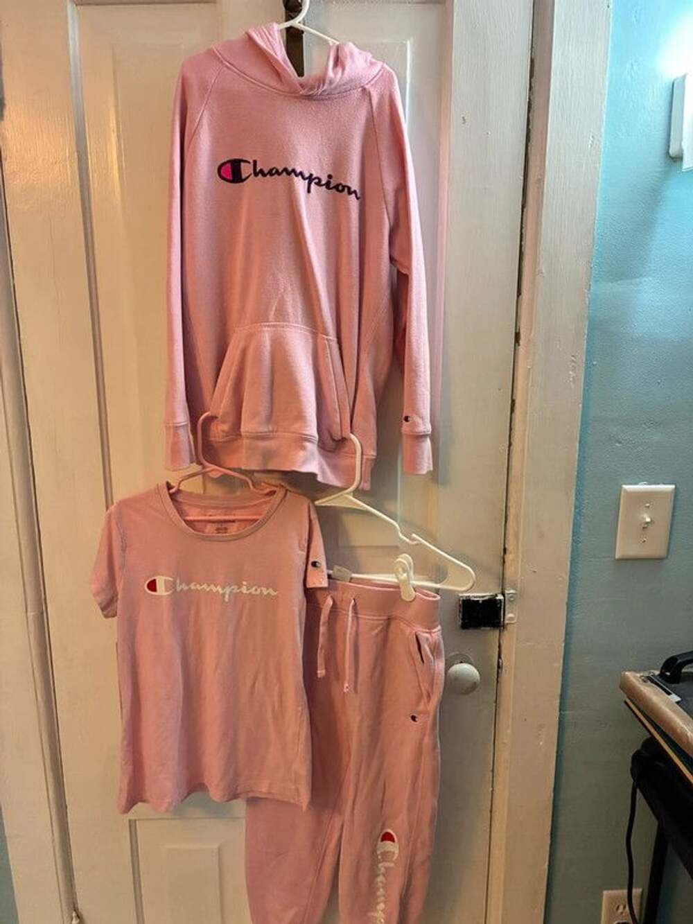 Champion pink kids set in size L, sweatpants are a M